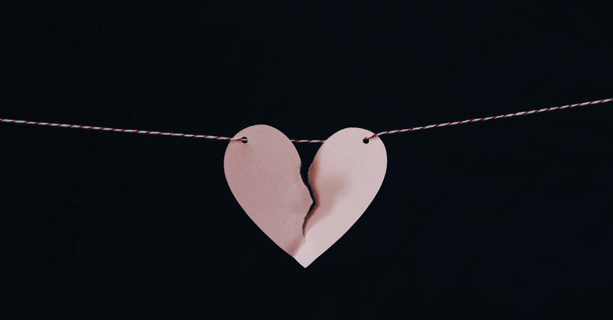 papercraft of a broken heart hanging on a string